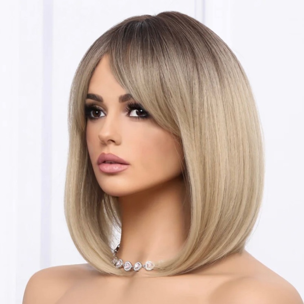 Three Synthetic wigs.